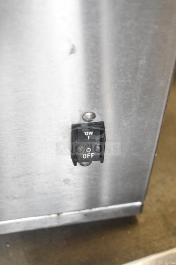 Bunn IC3 commercial iced tea machine, shown with power switch. 120/208V, 1 phase, stainless steel, good condition.