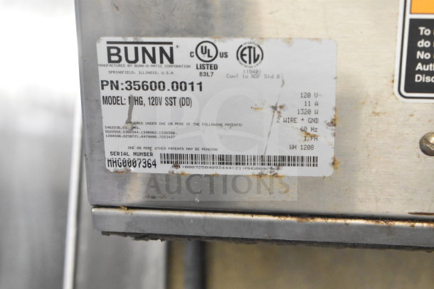 Bunn MHG Commercial Coffee Grinder, no hoppers. 120V, 1 phase. Model: MHG. Serial: MHG0007364. Some wear visible.