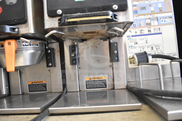 Bunn MHG Commercial Coffee Bean Grinder, no hoppers, 120V, 1 phase. Visible wear and warning labels indicating safety instructions.