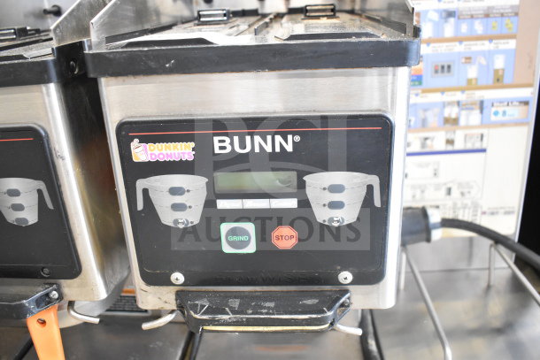 Bunn MHG Commercial Coffee Bean Grinder, no hoppers, stainless steel finish, 120 volts, with "Grind" and "Stop" buttons.