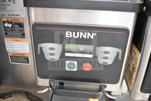 Bunn MHG Coffee Grinder, no hoppers, 120V, 1 phase, digital controls visible with Grind and Stop buttons.