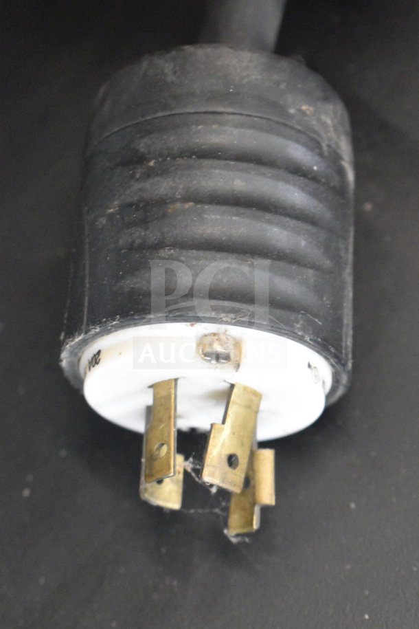 Close-up of a Bunn ICB-DV coffee machine power plug, featuring a three-prong configuration for 120 volts, 1 phase.
