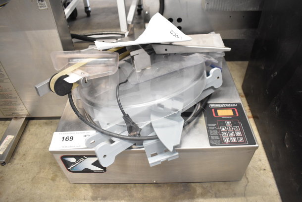 ChocoVision Revolation X3210 Chocolate Tempering Machine, 110 Volts, 1 Phase. Stainless steel, digital controls, used condition.
