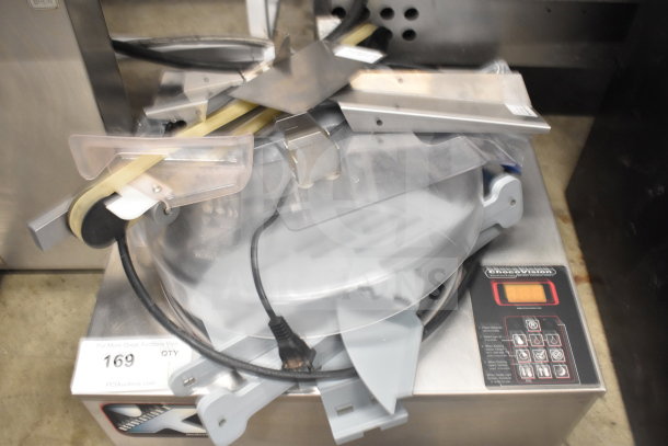 ChocoVision Revolation X3210 Chocolate Tempering Machine, 110V, 1 Phase, with visible control panel and accessories.