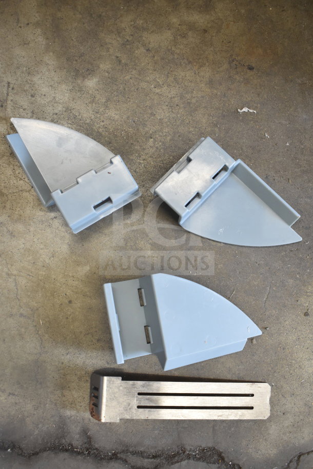 Components of a ChocoVision Revolation X3210 Chocolate Tempering Machine, 110 Volts, 1 Phase, shown on a concrete surface.