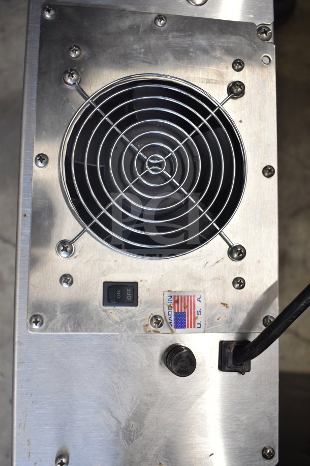 ChocoVision Revolation X3210 Chocolate Tempering Machine, stainless steel, 110V, 1 phase, with on/off switch and USA-made label.