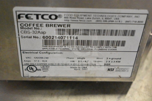 Fetco CBS-32Aap dual coffee machine label, showing model, serial number, and electrical specifications.