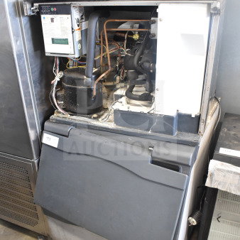 Scotsman Prodigy C0530SA-1B commercial ice machine head on bin. 115 volts, 1 phase, interior view, used condition.