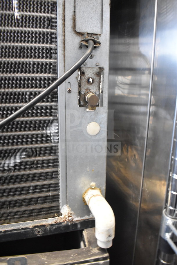 Scotsman Prodigy C0530SA-1B ice machine connections and surrounding components, showing wiring and plumbing.