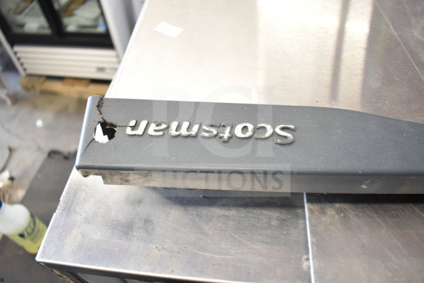 Scotsman Prodigy C0530SA-1B ice machine head on bin, visible wear and tear. 115V, 1 Phase.