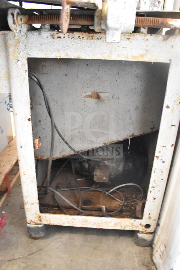 Hobart Commercial Floor Style Meat Saw with visible rust and wear. Exposed wires and motor. Needs restoration.