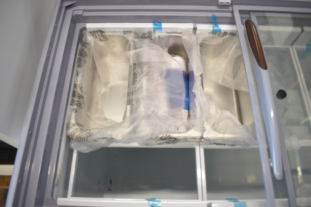 Brand new Avantco 360ADCGEL9 49" gelato dipping cabinet, 9 pans, 115V, 1 phase, sealed in protective wrap, minor scratches.