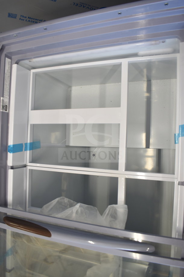 Alt text: "Brand new Avantco 360ADCGEL9 49-inch 9 pan gelato dipping cabinet. Visible scratch and dent. 115 volts, 1 phase."