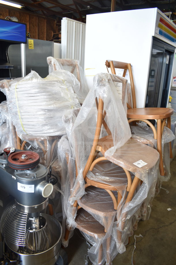 Flash Furniture wood pattern cross back chairs with cushions, scratch and dent, 17 pieces, wrapped in plastic film.
