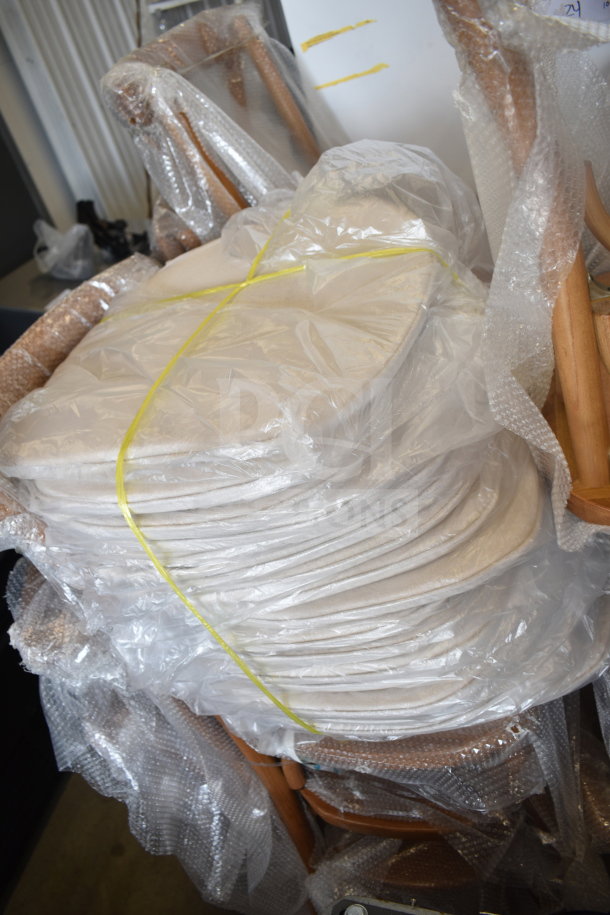 17 Flash Furniture wood pattern cross back chairs with cushions, new scratch and dent, wrapped in protective plastic and bubble wrap.