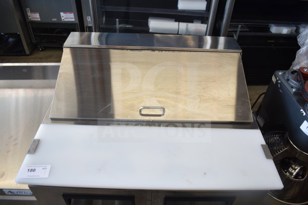 Brand new Avantco 178APT36HC commercial sandwich salad prep table, 115V, 1 phase; shows minor scratches and dents.