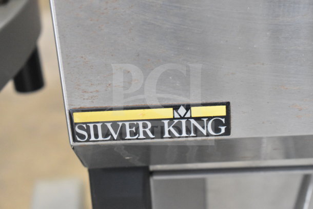 Silver King SKMAJ2/C4 commercial milk dispenser, stainless steel, 115 volts, with brand label.