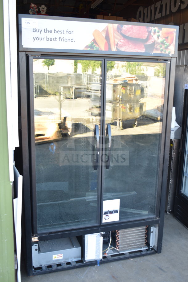 2021 True TVM-48SL-HC commercial 2-door cooler merchandiser, 115 volts, 1 phase, glass doors, and front panel branding.