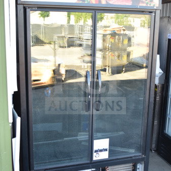 2021 True TVM-48SL-HC commercial 2-door cooler merchandiser, 115 volts, 1 phase, glass doors, and front panel branding.