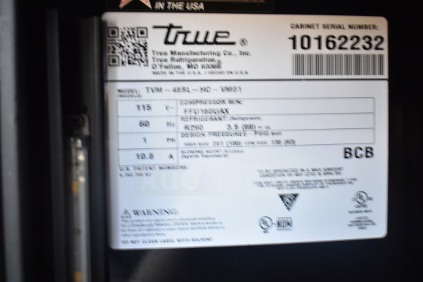 2021 True TVM-48SL-HC commercial cooler label showing model, voltage, refrigerant type, and serial number 10162232.