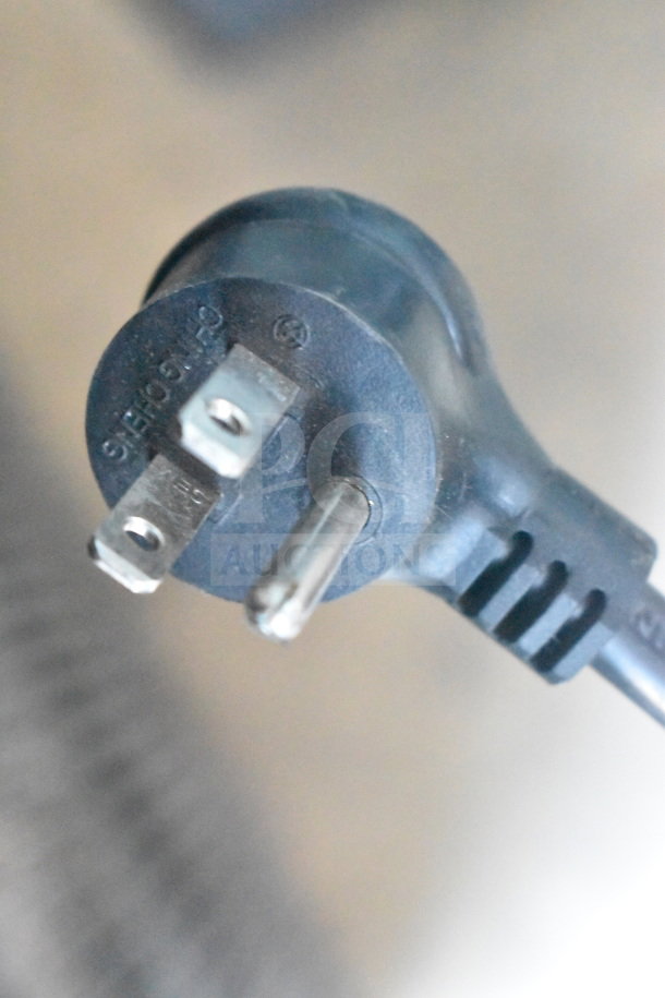 Close-up of 115-volt plug compatible with 2021 True TVM-48SL-HC Commercial Cooler Merchandiser.