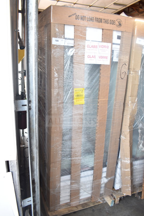 Brand new 2026 True TSCI-600R-G-PH reach-in cooler merchandiser, single door, 115V, scratch and dent, wrapped on pallet.