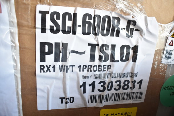 Brand new True TSCI-600R-G-PH commercial cooler, 115V, 1 phase, scratch and dent, label shows model and item number 11303831.