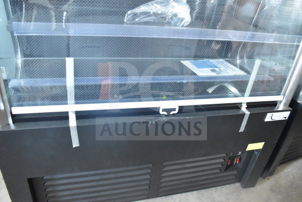 Brand new Avantco 193VAC46B 45 1/2" black refrigerated air curtain merchandiser, 115V, with protective wrapping.