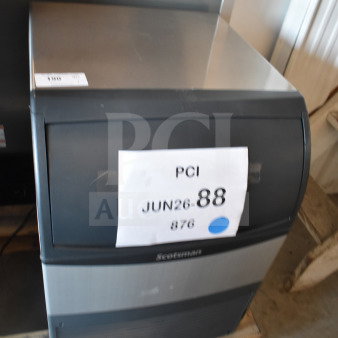 BRAND NEW Scotsman UF424AX-1A 24" undercounter flake ice machine, 80 lb. bin, 440 lb. capacity, 115V, tags indicate model and condition.