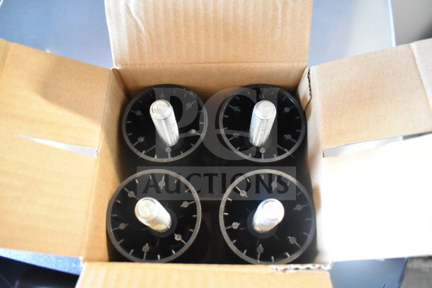 Box of four cylindrical components with threaded ends, inside a cardboard box, possibly parts for a Scotsman ice machine.