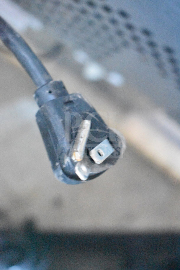 Power plug of Scotsman UF424AX-1A ice machine, 115 volts, part of undercounter model with 440 lb capacity.