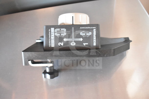 Bizerba meat slicer sharpener, black, adjustable settings, model number visible, excellent condition.