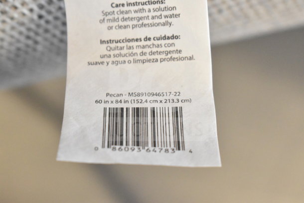 Mainstays Pecan Rug label, model MS8910946517-22, dimensions 60"x84" (152.4x213.3 cm). Care instructions included.