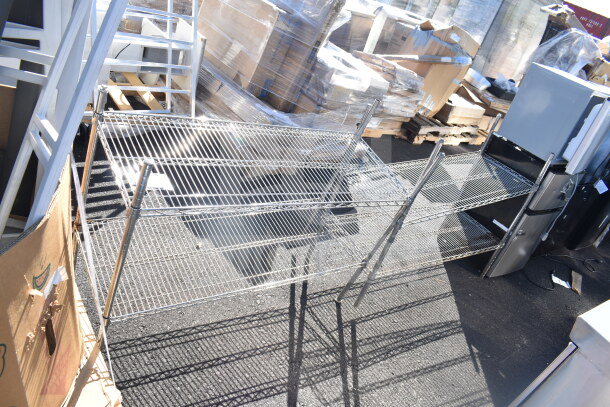 Two chrome finish wire shelves, excellent condition, sturdy design, ideal for storage and organization.