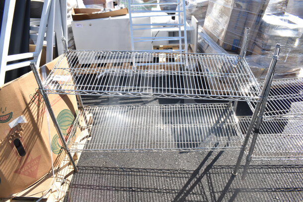 Two chrome finish wire shelves, sturdy design, excellent condition, ideal for storage, auction includes doubling your bid quantity.