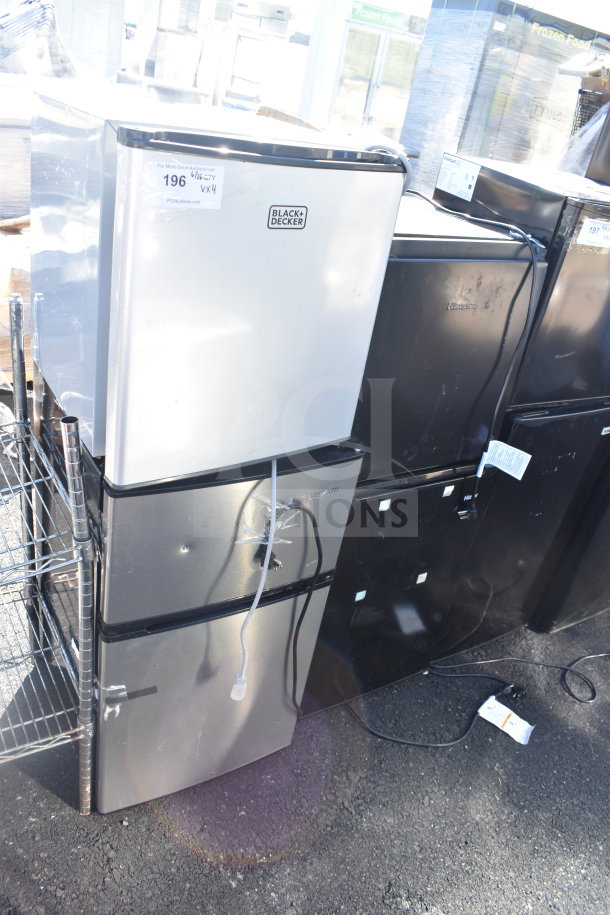 Four mini coolers, brands include Black & Decker and Vissani. 120 volts, 1 phase, mixed colors. Auction lot, good condition.