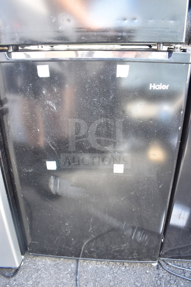 Four mini coolers including Black & Decker and Vissani, 120V, 1 phase, auctioned as four times your bid. Visible Haier label.