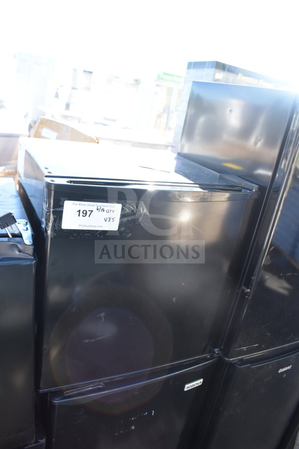 5 various mini coolers including Igloo and MainStays, 120 volts, 1 phase, visible label with auction details.