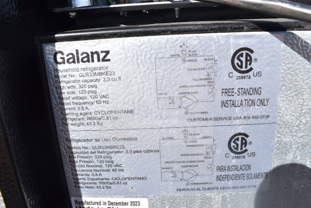 Five mini coolers, including Igloo and MainStays, 120V, 1 phase; Galanz model GLR33MBKE23 label details specs.