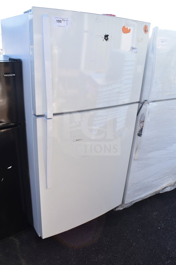 Whirlpool WRT511SZDW00 cooler with freezer, white, 115V, 1 phase; visible wear and markings. Model tags present.