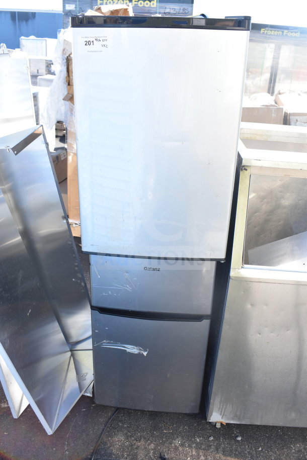 Two mini coolers, including a Galanz model, silver finish, 120 volts, 1 phase. Visible wear, auction tag: Lot 201.