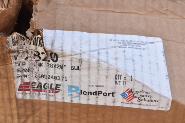 Torn cardboard box with "Eagle Group," "BlendPort," and "American Creative Solutions" logos. Partially visible barcode and text.