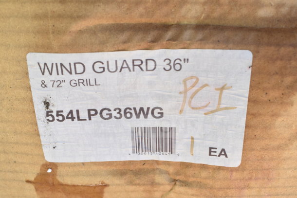 Label showing "Wind Guard 36" & 72" Grill, 554LPG36WG," with barcode and handwritten marks, indicating one unit.