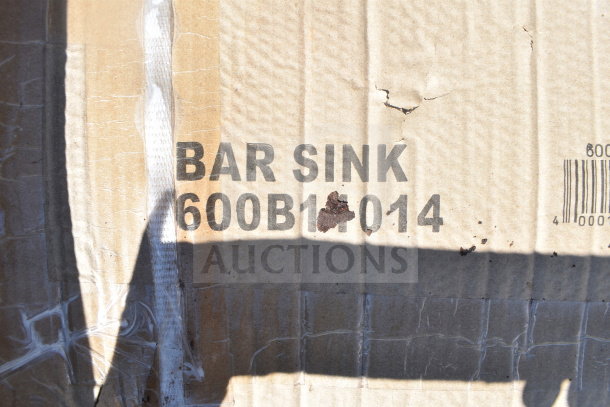 Cardboard packaging for Regency 600B11014 bar sink, labeled "BAR SINK 600B11014," slightly worn with visible creases.