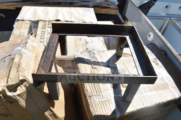 5 brand new scratch and dent items, including Regency hand sink and Lancaster table top, unboxed on pallets.