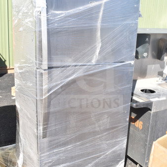 2024 Whirlpool 21MSTFATR6 reach-in cooler with freezer, wrapped for shipment, new condition, 115 volts, 1 phase.