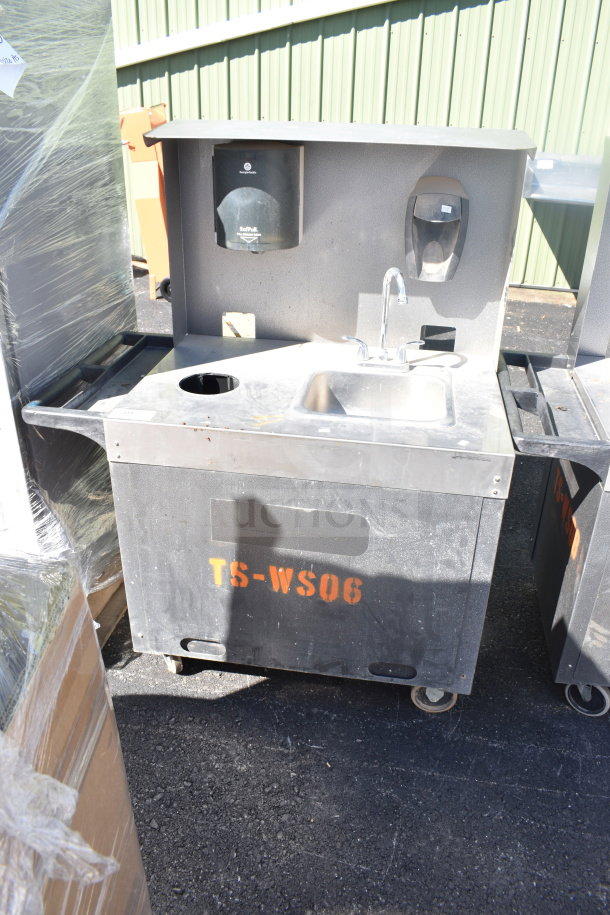 Commercial portable sink on casters, with faucet and soap dispenser. Marked "TS-WS06." Suitable for mobile use.