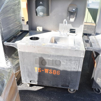 Commercial portable sink on casters, with faucet and soap dispenser. Marked "TS-WS06." Suitable for mobile use.