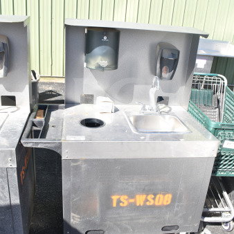 Commercial portable sink on casters with soap dispensers, stainless steel basin, labeled "TS-WS08," used condition.