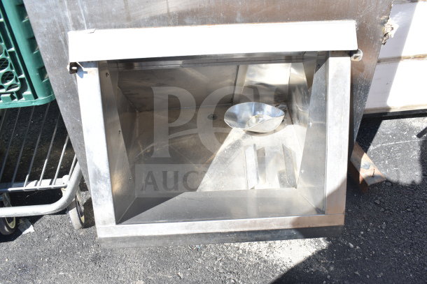 MGR Commercial Ice Machine Bin, stainless steel, open front, includes metal scoop, used condition, outdoor setting.